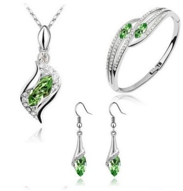 New Angel Elf Earrings Necklace Bracelet Three-piece Austria Crystal Alloy Jewelry Set Wholesale $22.00 Dana Fashion Color: Baby red Women's Accessories Style: Europe and America Material: Alloy Process: crystal Set combination: earrings + accessories + j