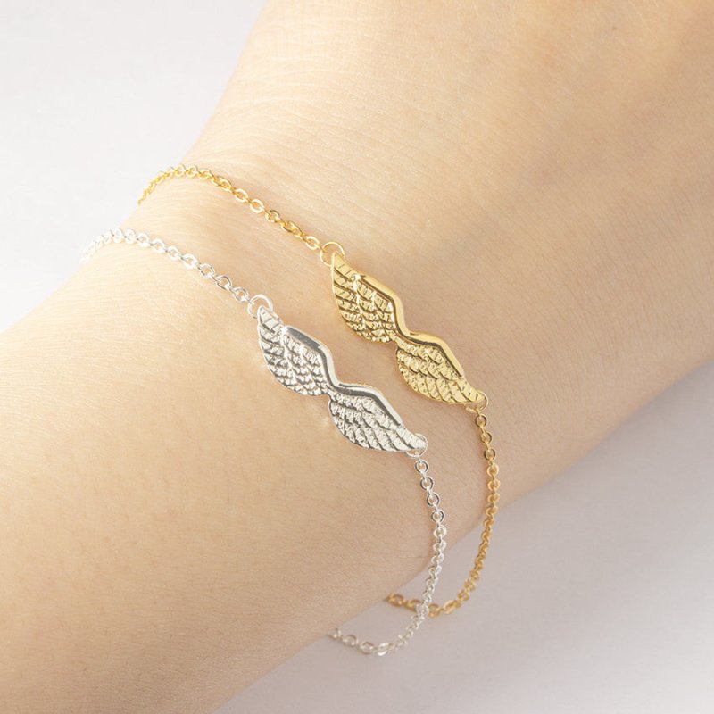 New Angel Wings Charm Bracelet $12.18 Dana Fashion Color: Gold Plating Women's Accessories Product information: Treatment Process: Electroplating Type: Bracelet Color: gold plated, silver plated, rose gold Material: Copper Modeling: animal/Zodiac Popular