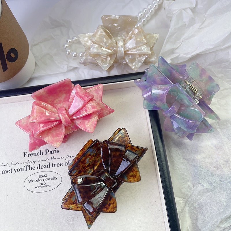New Autumn And Winter High Sense Bow Claw Clip $18.00 Dana Fashion Color: 1 Purple Women's Accessories Product information: Processing Technology: Handmade Color: 1# purple, 2# blue brown, 3# textured blue, 4# leopard print, 5# starry sky purple, 6# Pink,