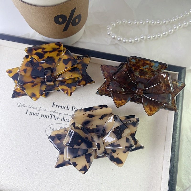 New Autumn And Winter High Sense Bow Claw Clip $18.00 Dana Fashion Color: 1 Purple Women's Accessories Product information: Processing Technology: Handmade Color: 1# purple, 2# blue brown, 3# textured blue, 4# leopard print, 5# starry sky purple, 6# Pink,