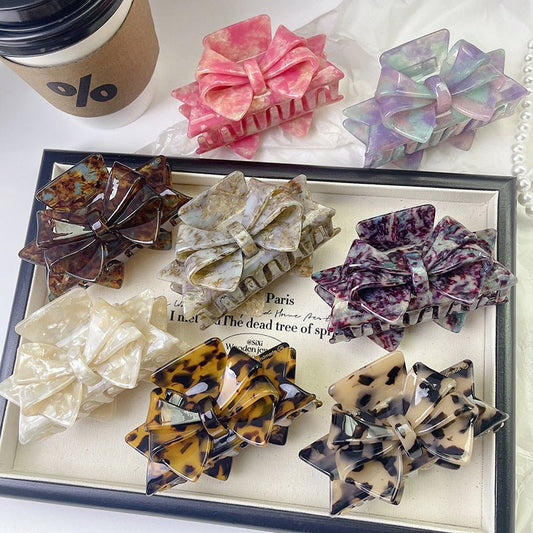New Autumn And Winter High Sense Bow Claw Clip $18.00 Dana Fashion Color: 1 Purple Women's Accessories Product information: Processing Technology: Handmade Color: 1# purple, 2# blue brown, 3# textured blue, 4# leopard print, 5# starry sky purple, 6# Pink,