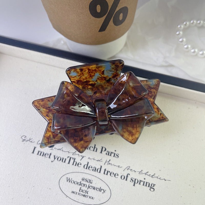 New Autumn And Winter High Sense Bow Claw Clip $18.00 Dana Fashion Color: 2 Blue Brown Women's Accessories Product information: Processing Technology: Handmade Color: 1# purple, 2# blue brown, 3# textured blue, 4# leopard print, 5# starry sky purple, 6# P