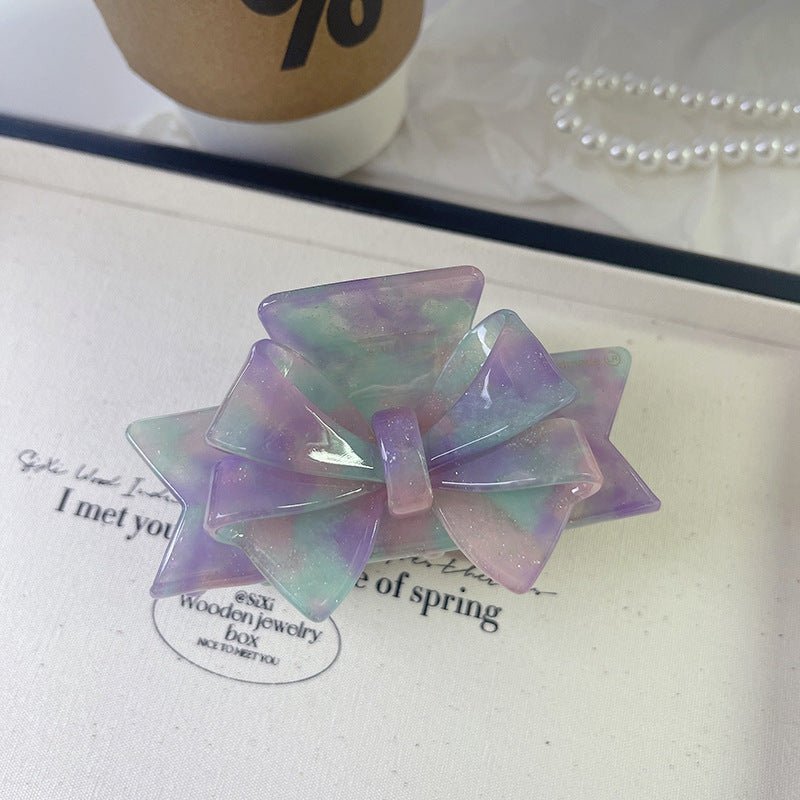 New Autumn And Winter High Sense Bow Claw Clip $18.00 Dana Fashion Color: 5 Starry Sky Purple Women's Accessories Product information: Processing Technology: Handmade Color: 1# purple, 2# blue brown, 3# textured blue, 4# leopard print, 5# starry sky purpl