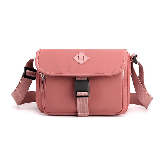 New Crossbody Versatile Simple Shoulder Bag $25.99 Dana Fashion Color: Pink Women's Bags Product information: Lining texture: Polyester Pattern: solid color Color: black, gray, dark blue, light blue, pink, purple, purplish red Processing Method: soft surf