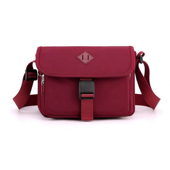 New Crossbody Versatile Simple Shoulder Bag $25.99 Dana Fashion Color: Purplish Red Women's Bags Product information: Lining texture: Polyester Pattern: solid color Color: black, gray, dark blue, light blue, pink, purple, purplish red Processing Method: s