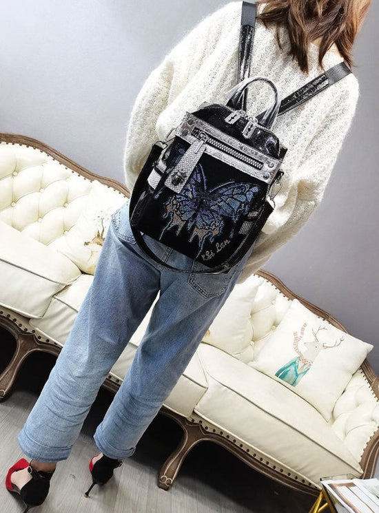 New Delicate Rhinestone Personality Butterfly Shoulder Bag $98.00 Dana Fashion Color: Black Women's Bags Product information: Applicable scenarios: Leisure Color classification: black, Gun Color Lining material: Nylon Hardness of bag: Soft Degree of water