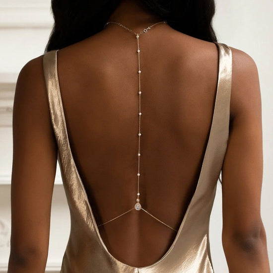 New Elegant Bead Back Chain Women's Wedding Bridal Rhinestone Back Decoration $23.85 Dana Fashion Color: Gold Women's Accessories Product information: Type: Back chain Color: silver, gold Style: Women's Material: Alloy Shape: drop shape Style: Simple Size
