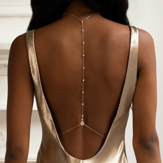 New Elegant Bead Back Chain Women's Wedding Bridal Rhinestone Back Decoration $23.85 Dana Fashion Color: Gold Women's Accessories Product information: Type: Back chain Color: silver, gold Style: Women's Material: Alloy Shape: drop shape Style: Simple Size