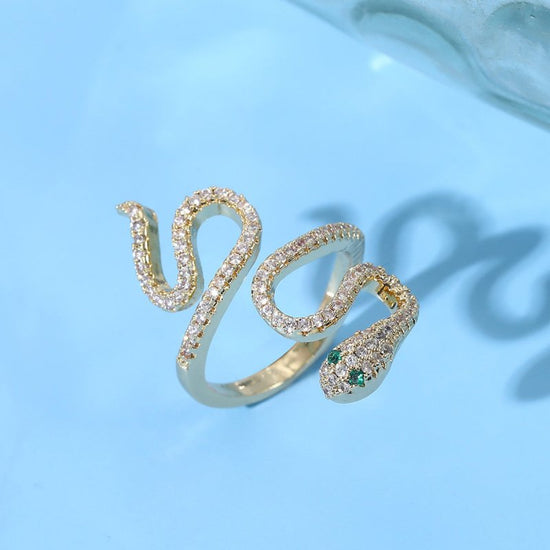 New European And American Diamond Cobra Ring $24.00 Dana Fashion Color: JZ0133 Women's Accessories Product information: Treatment Process: gold inlay Applicable gift-giving occasions: tourism commemoration, festivals, trade fairs, advertising promotions,