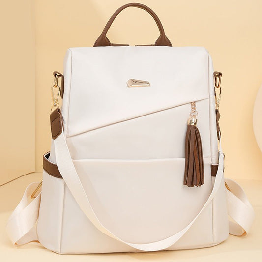 New Fashion Tassel Women's Backpack Casual Simple $42.55 Dana Fashion Color: Beige Women's Bags Product information: Color: cream-white, black, brown Outer bag type: split pocket Function: waterproof, durable, anti-theft Material: Nylon Style: Urban Simpl