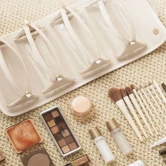 New Folding Cosmetic Bag Large Capacity Portable Handbag Waterproof Travel Storage Washing Bag For Women $35.00 Dana Fashion Color: Beige Women's Bags Overview: Unique design, stylish and beautiful. Good material, comfortable wear. A variety of colors, an