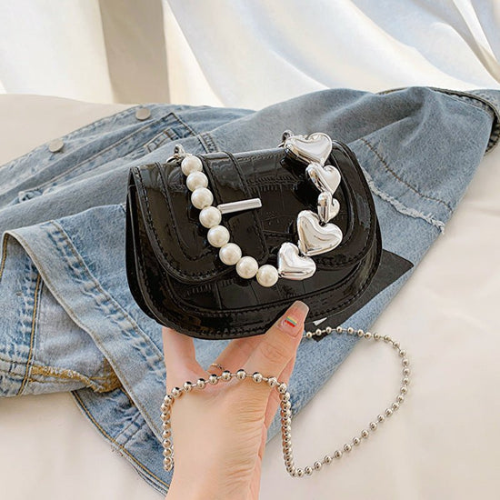 New Laser Pearl Tote Saddle Girl Mini $28.23 Dana Fashion Color: Black Women's Bags Product information: Lining texture: synthetic leather Applicable scenarios: Daily matching Color: silver, black, pink, green, gold Outer bag type: Sandwich pocket Hardnes