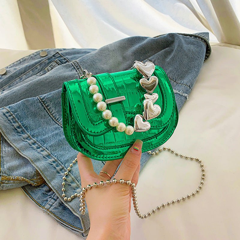 New Laser Pearl Tote Saddle Girl Mini $28.23 Dana Fashion Color: Green Women's Bags Product information: Lining texture: synthetic leather Applicable scenarios: Daily matching Color: silver, black, pink, green, gold Outer bag type: Sandwich pocket Hardnes