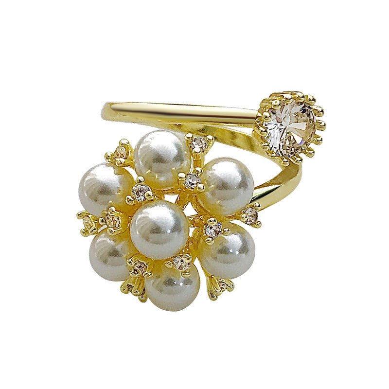 New Pearl Rhinestone Fashion Ring $15.69 Dana Fashion Color: Gold Size: Adjustable Opening Women's Accessories Product information: Type: open mouth Treatment Process: inlaid zircon Color: Gold Applicable population: Female Style: Female Material: Copper