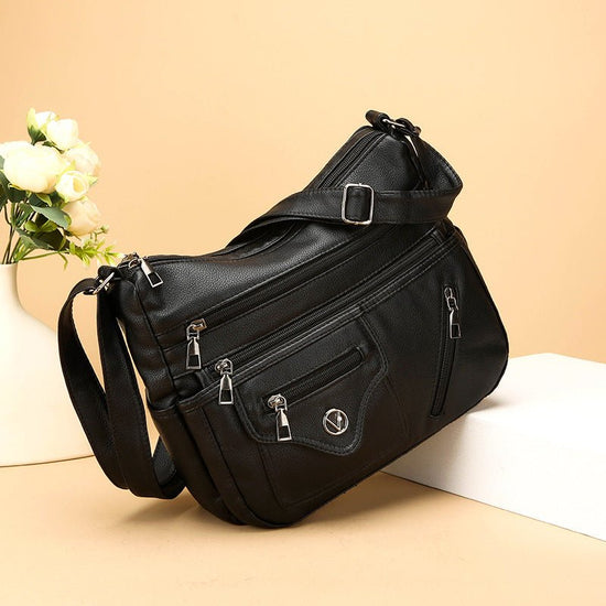 New Simple Fashion Shoulder Crossbody Bag $30.00 Dana Fashion Color: Black Women's Bags Product information: Lining texture: Polyester Applicable scenarios: Daily matching Color: 833 Black Outer bag type: Sandwich pocket Hardness: soft Material: PU Suitca
