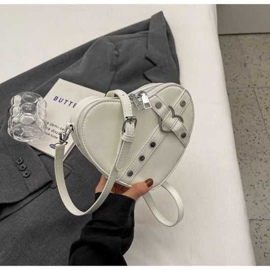 New Spring Trend Sense Cute Fashionable Shoulder Messenger Bag $31.08 Dana Fashion Color: Beige Women's Bags Product information: Lining text: Nylon Applicable scenarios: Daily match Color: black, cream white, silver, wine red Outer bag type: Pocket Sandw