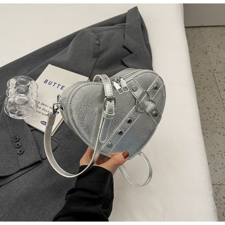 New Spring Trend Sense Cute Fashionable Shoulder Messenger Bag $31.08 Dana Fashion Color: Silver Women's Bags Product information: Lining text: Nylon Applicable scenarios: Daily match Color: black, cream white, silver, wine red Outer bag type: Pocket Sand