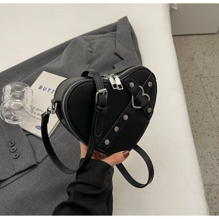 New Spring Trend Sense Cute Fashionable Shoulder Messenger Bag $31.08 Dana Fashion Color: Black Women's Bags Product information: Lining text: Nylon Applicable scenarios: Daily match Color: black, cream white, silver, wine red Outer bag type: Pocket Sandw