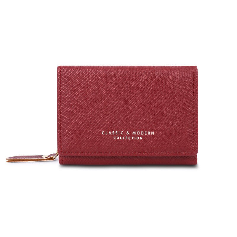 New Three Cute Folding Women's Crossed Coin Purse $32.68 Dana Fashion Color: Purplish Red Women's Bags Product information: Pattern: solid color Lining texture: Polyester Applicable scenario: Daily configuration Color: black, dark purple, purplish red, li