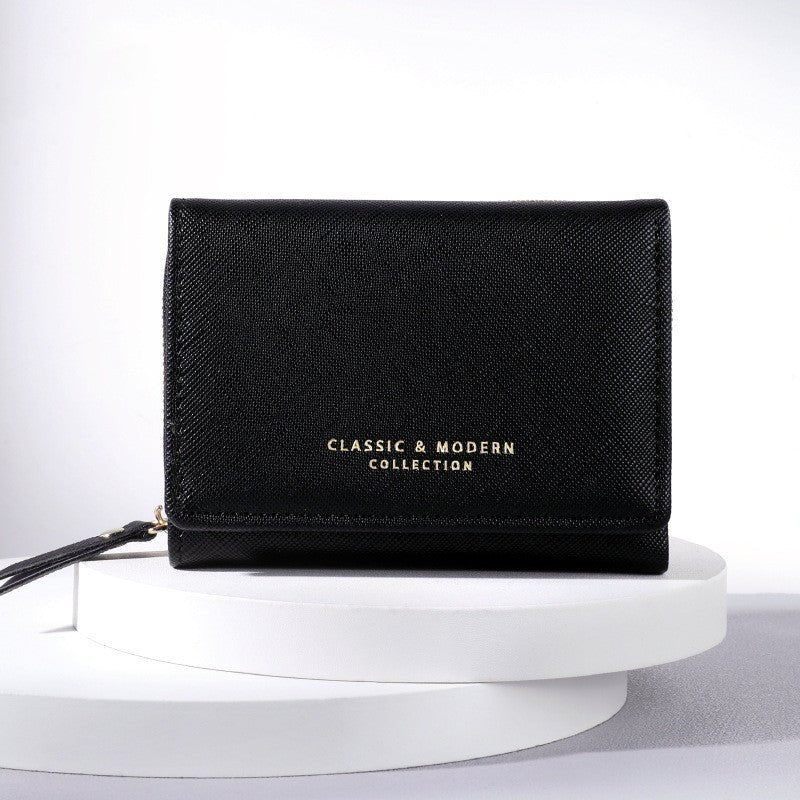 New Three Cute Folding Women's Crossed Coin Purse $32.68 Dana Fashion Color: Black Women's Bags Product information: Pattern: solid color Lining texture: Polyester Applicable scenario: Daily configuration Color: black, dark purple, purplish red, light yel