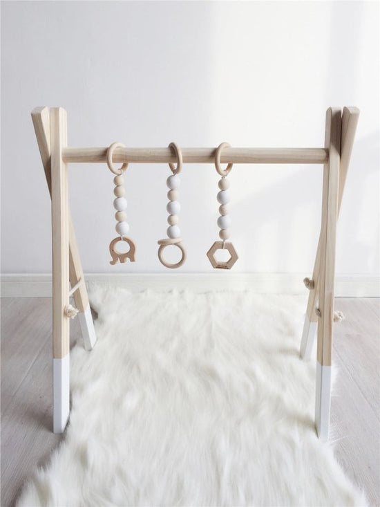 Newborn baby baby fitness frame $76.76 Dana Fashion Color: White Baby & Mother Features: Made of high-quality wood, safe and non-toxic. You can save space and decorate the room. Very suitable for living room, bedroom, children's room, etc. Train your baby