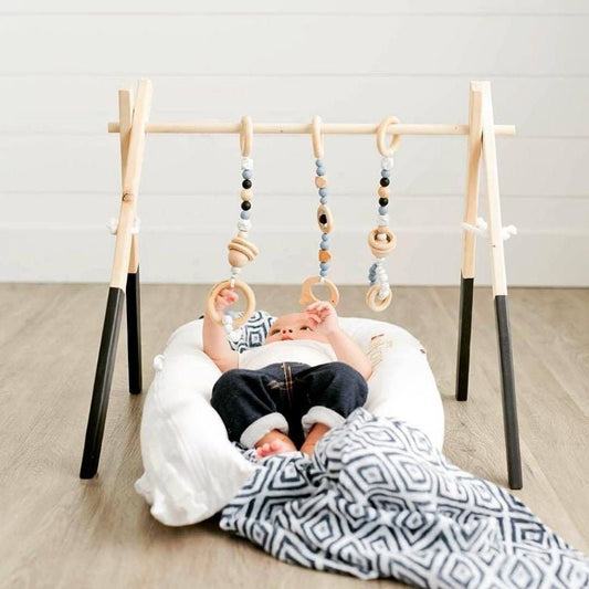 Newborn baby baby fitness frame $76.76 Dana Fashion Color: Black Baby & Mother Features: Made of high-quality wood, safe and non-toxic. You can save space and decorate the room. Very suitable for living room, bedroom, children's room, etc. Train your baby