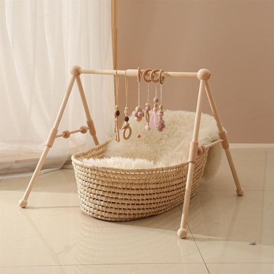 Newborn Baby Crib Fitness Rack $68.81 Dana Fashion Color: Log fitness rack Baby & Mother Product information: Toy material: wooden Features: posing to exercise baby's hands-on ability Ability training: vision, intellectual development, manual brain, grasp