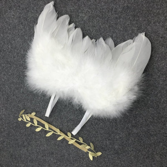 Newbornx Photography Props White Angel Wing Baby $10.06 Dana Fashion Color: 1coler Baby Clothing Product information: Sales:serial:number:YW15 Suitable:for:gift-giving:occasions Modeling:flowers Custom:processing::Yes Material:Feather Color:green,:white,: