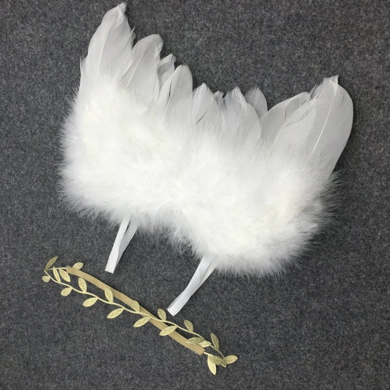 Newbornx Photography Props White Angel Wing Baby $10.06 Dana Fashion Color: 1coler Baby Clothing Product information: Sales:serial:number:YW15 Suitable:for:gift-giving:occasions Modeling:flowers Custom:processing::Yes Material:Feather Color:green,:white,: