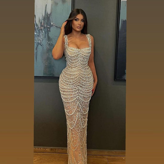 Nude Elegant Sling Light Luxury High-end Pearl Beaded Dress $679.99 Dana Fashion Color: Naked Size: L Women's clothing Product information: Color: Nude Waist type: high waist Size: XS,S,M,L,XL,XXL,XXL,XXXXL Skirt length: long skirt Popular elements: beade