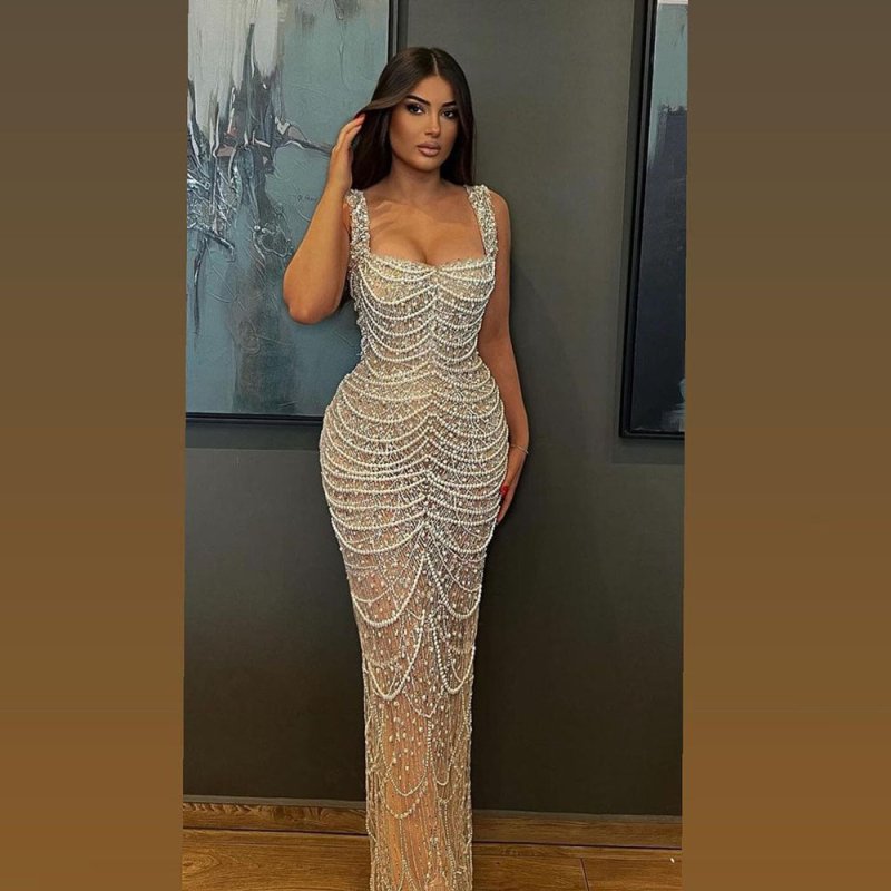 Nude Elegant Sling Light Luxury High-end Pearl Beaded Dress $679.99 Dana Fashion Color: Naked Size: L Women's clothing Product information: Color: Nude Waist type: high waist Size: XS,S,M,L,XL,XXL,XXL,XXXXL Skirt length: long skirt Popular elements: beade