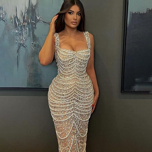 Nude Elegant Sling Light Luxury High-end Pearl Beaded Dress $679.99 Dana Fashion Color: Naked Size: L Women's clothing Product information: Color: Nude Waist type: high waist Size: XS,S,M,L,XL,XXL,XXL,XXXXL Skirt length: long skirt Popular elements: beade
