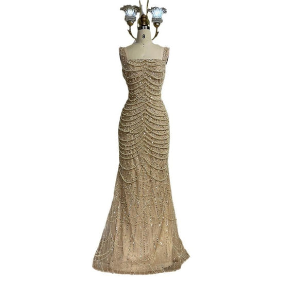 Nude Elegant Sling Light Luxury High-end Pearl Beaded Dress $679.99 Dana Fashion Color: Naked Size: L Women's clothing Product information: Color: Nude Waist type: high waist Size: XS,S,M,L,XL,XXL,XXL,XXXXL Skirt length: long skirt Popular elements: beade