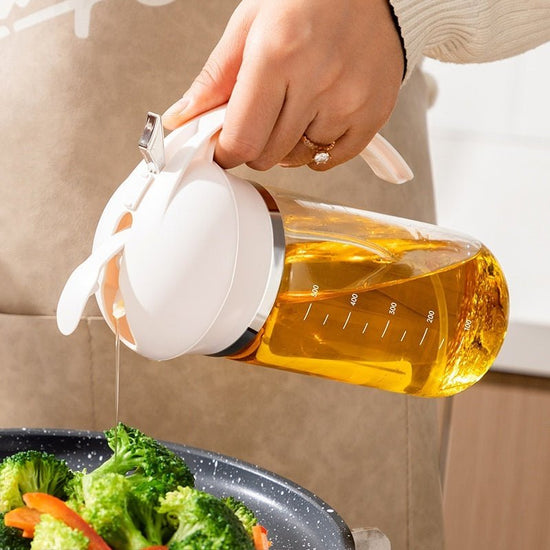 Oil Dispenser Spray And Pour Dual-purpose Oiler $28.00 Dana Fashion capacity: Black 500ml Dana's Kitchen Product information: Function: pour oil/turn Oil Brush into one, press and spray oil Material: Glass Style: modern simplicity Capacity: Black 500ml, y