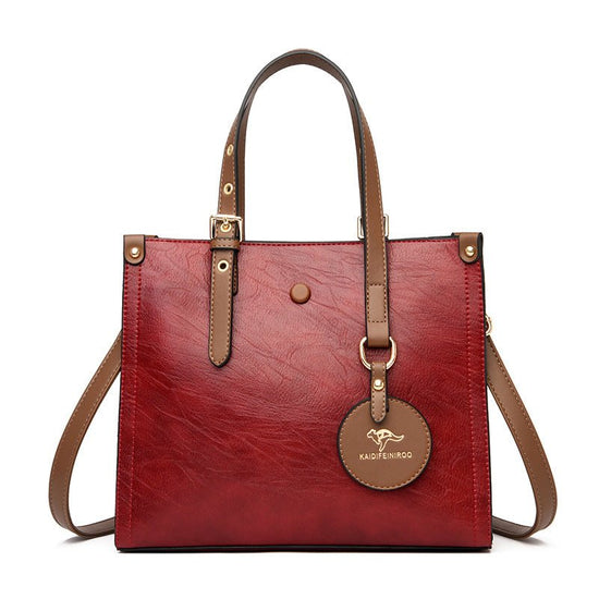 Oil Wax Cowhide Commuter Elegant Women Bag $83.33 Dana Fashion Color: Red Women's Bags Product information: Pattern: solid color Color: red, green, blue, black, yellow Brown Material: genuine leather Popular elements: Retro, contrast color Suitcase shape: