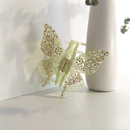 Oversized Light Luxury Glass Butterfly Hair Claw Headdress $33.10 Dana Fashion Color: Crystal Pink Women's Accessories Product information: Treatment Process: Diamond Color: Jelly Green, jelly yellow, Crystal Pink Applicable people: women Style: Women's M