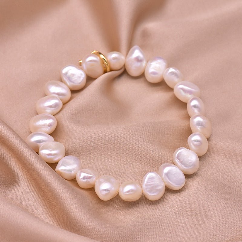 Pearl Bracelet Women's Design Sense Niche Turquoise $39.50 Dana Fashion Color: Pearl Stretch Bracelet Women's Accessories Product information: Treatment Process: Electroplating Color: Turquoise Pearl bracelet, lapis lazuli pendant Clover pearl bracelet, d