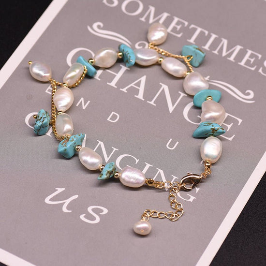 Pearl Bracelet Women's Design Sense Niche Turquoise $39.50 Dana Fashion Color: Turquoise Pearl Bracelet Women's Accessories Product information: Treatment Process: Electroplating Color: Turquoise Pearl bracelet, lapis lazuli pendant Clover pearl bracelet,