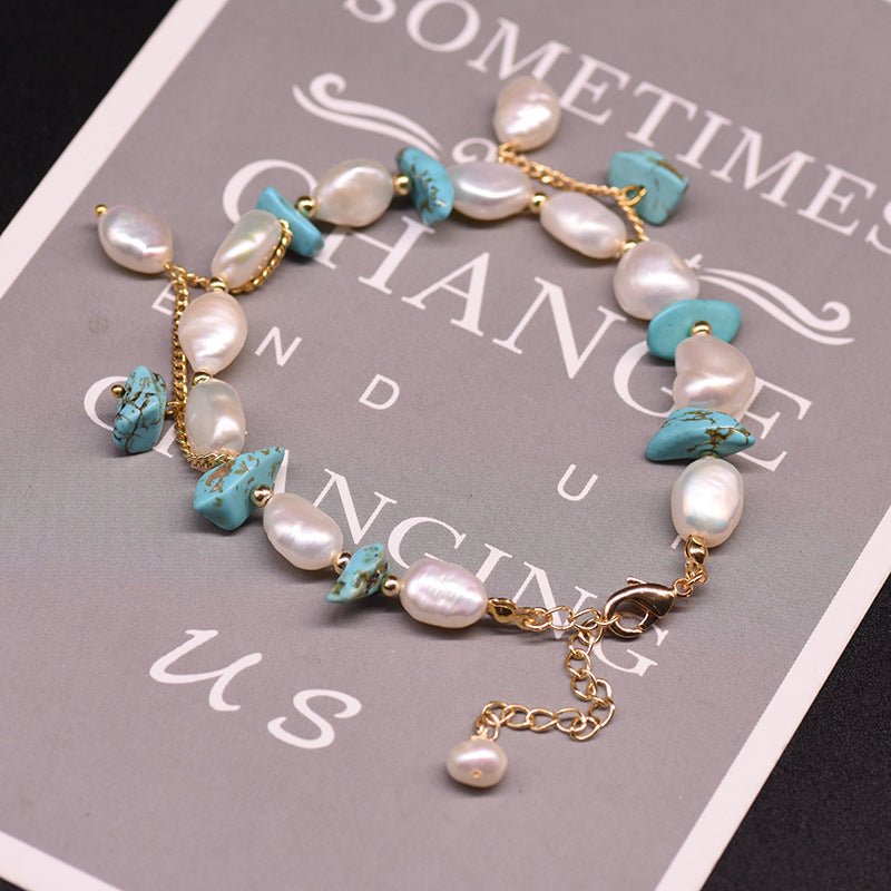 Pearl Bracelet Women's Design Sense Niche Turquoise $39.50 Dana Fashion Color: Turquoise Pearl Bracelet Women's Accessories Product information: Treatment Process: Electroplating Color: Turquoise Pearl bracelet, lapis lazuli pendant Clover pearl bracelet,