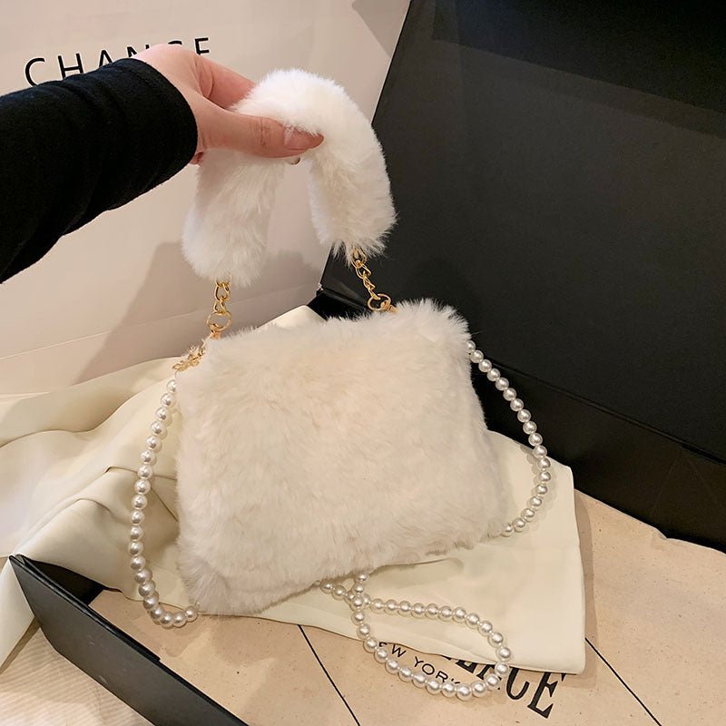 Pearl Chain Plush Bag Female Ins Korean Style $19.50 Dana Fashion Color: Beige Style: Ordinary Chain Strap Women's Bags Product information: Color: Milky White, khaki, pink, medium gray, light gray, black, cameo brown, gray and red Material: Plush Suitcas