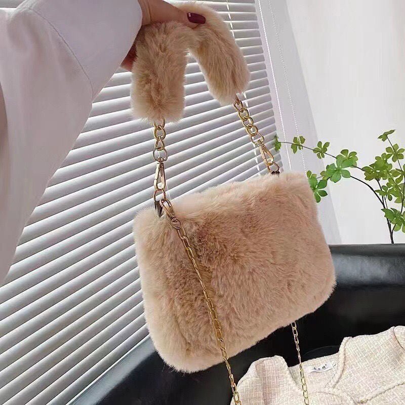 Pearl Chain Plush Bag Female Ins Korean Style $19.50 Dana Fashion Color: Khaki Style: Ordinary Chain Strap Women's Bags Product information: Color: Milky White, khaki, pink, medium gray, light gray, black, cameo brown, gray and red Material: Plush Suitcas