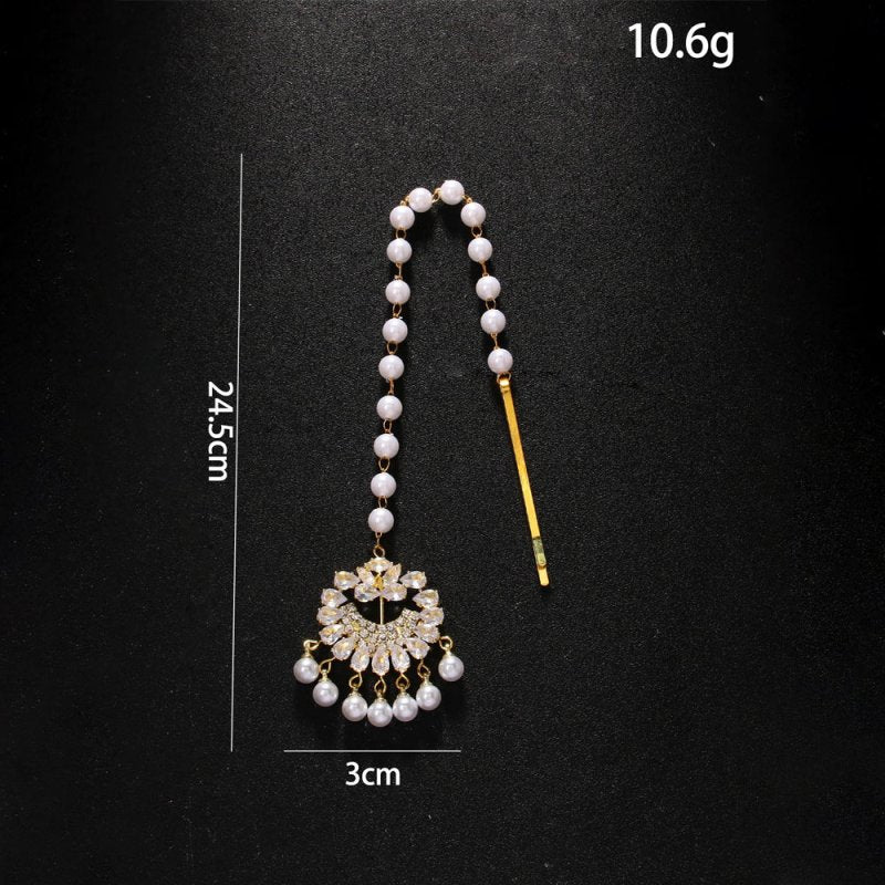 Pearl Forehead Diamond Headdress Ethnic Exotic Style Rhinestone Hair Chain $27.11 Dana Fashion Color: Gold Women's Accessories Product information: Color: gold, silver Material: Rhinestone Popular elements: Tassel Style: European and American Style: weddi