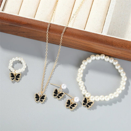 Pearl Ornament Butterfly Necklace For Women Bracelet Ring Earrings Suit $19.90 Dana Fashion Color: Black Women's Accessories Product information: Treatment Process: Electroplating Color: white, black, pink Pendant material: Alloy Chain style: Pearl Chain
