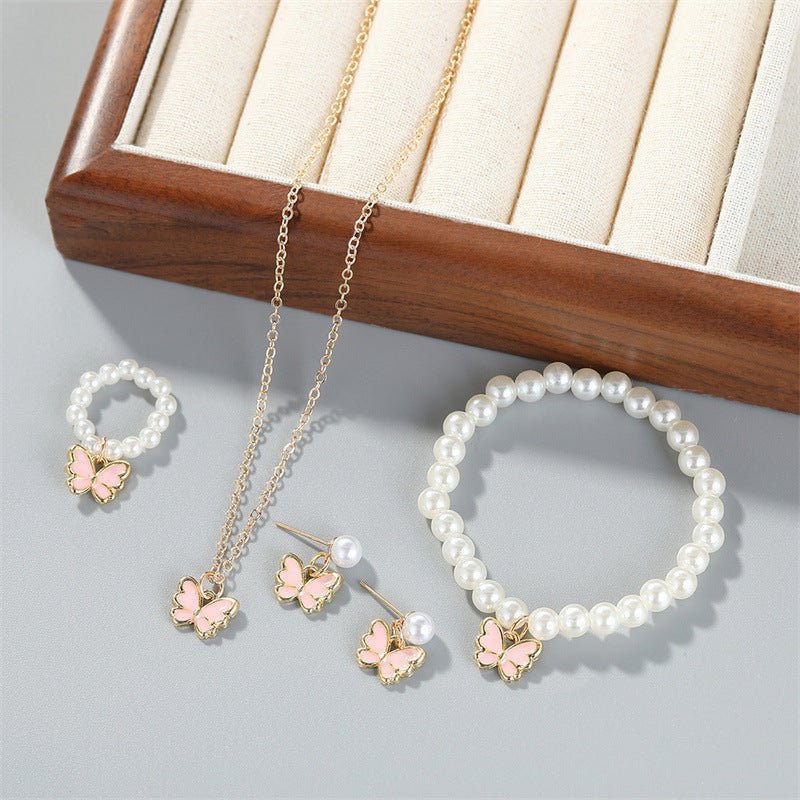 Pearl Ornament Butterfly Necklace For Women Bracelet Ring Earrings Suit $19.90 Dana Fashion Color: Pink Women's Accessories Product information: Treatment Process: Electroplating Color: white, black, pink Pendant material: Alloy Chain style: Pearl Chain M