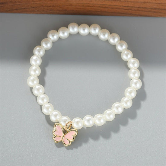 Pearl Ornament Butterfly Necklace For Women Bracelet Ring Earrings Suit $19.90 Dana Fashion Color: Black Women's Accessories Product information: Treatment Process: Electroplating Color: white, black, pink Pendant material: Alloy Chain style: Pearl Chain