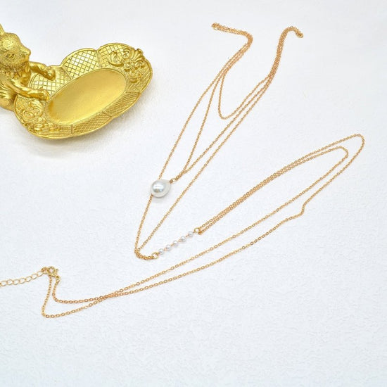 Pearl Pendant Multi-layer Back Chain $15.00 Dana Fashion Color: Gold Women's Accessories Product information: Treatment Process: Electroplating Color: Gold Pendant material: Alloy Chain style: Other Material: Alloy Shape: Geometric Popular elements: Ellip