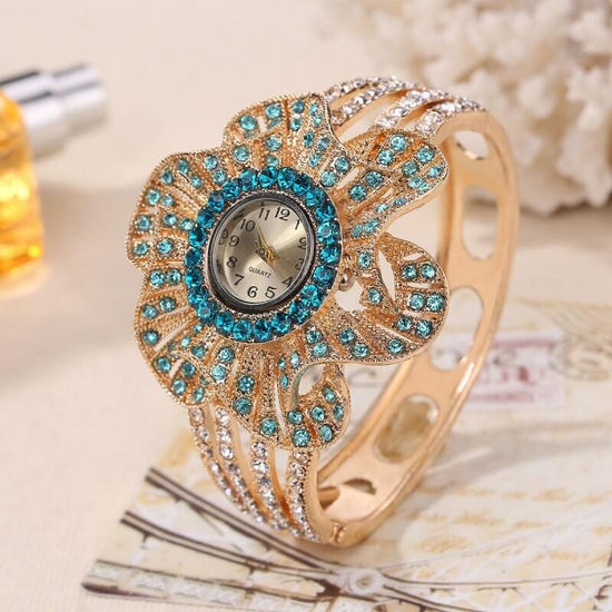 Personalized rhinestone bracelet watch $19.50 Dana Fashion Color: Blue Women's Accessories Display type: pointer style: Casual Waterproof: no Movement type: Quartz Movement model: 377 Thickness: 7mm Dial diameter: 24mm Crown type: ordinary crown Table bot