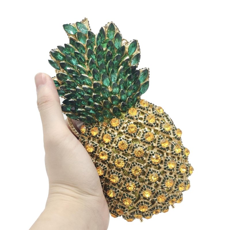 Pineapple Rhinestone Banquet Clutch $169.00 Dana Fashion Color: Color2 Women's Bags Material: metal Applicable scenarios: meal bag, banquet bag, evening bag, banquet bag Fabric texture: alloy Lining material: PU Bag shape: pineapple Size: 20x10x10cm Popul
