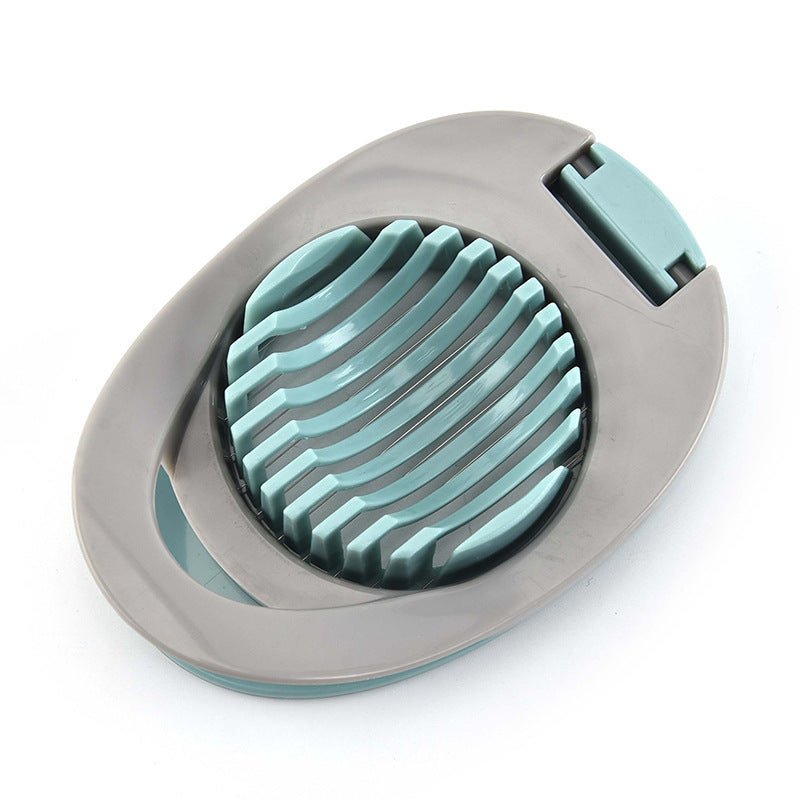 Plastic Kitchen Tool Egg Slicer Shredder Fruit Slicer Kitchen Slicing Gadget Kitchen Wire Pressing Cutter $9.50 Dana Fashion Color: Grey green Dana's Kitchen material: plastic Quantity: 1 x egg slicer Features: 1. Made of high-quality stainless steel wire