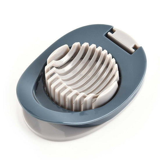 Plastic Kitchen Tool Egg Slicer Shredder Fruit Slicer Kitchen Slicing Gadget Kitchen Wire Pressing Cutter $9.50 Dana Fashion Color: Grey blue Dana's Kitchen material: plastic Quantity: 1 x egg slicer Features: 1. Made of high-quality stainless steel wire